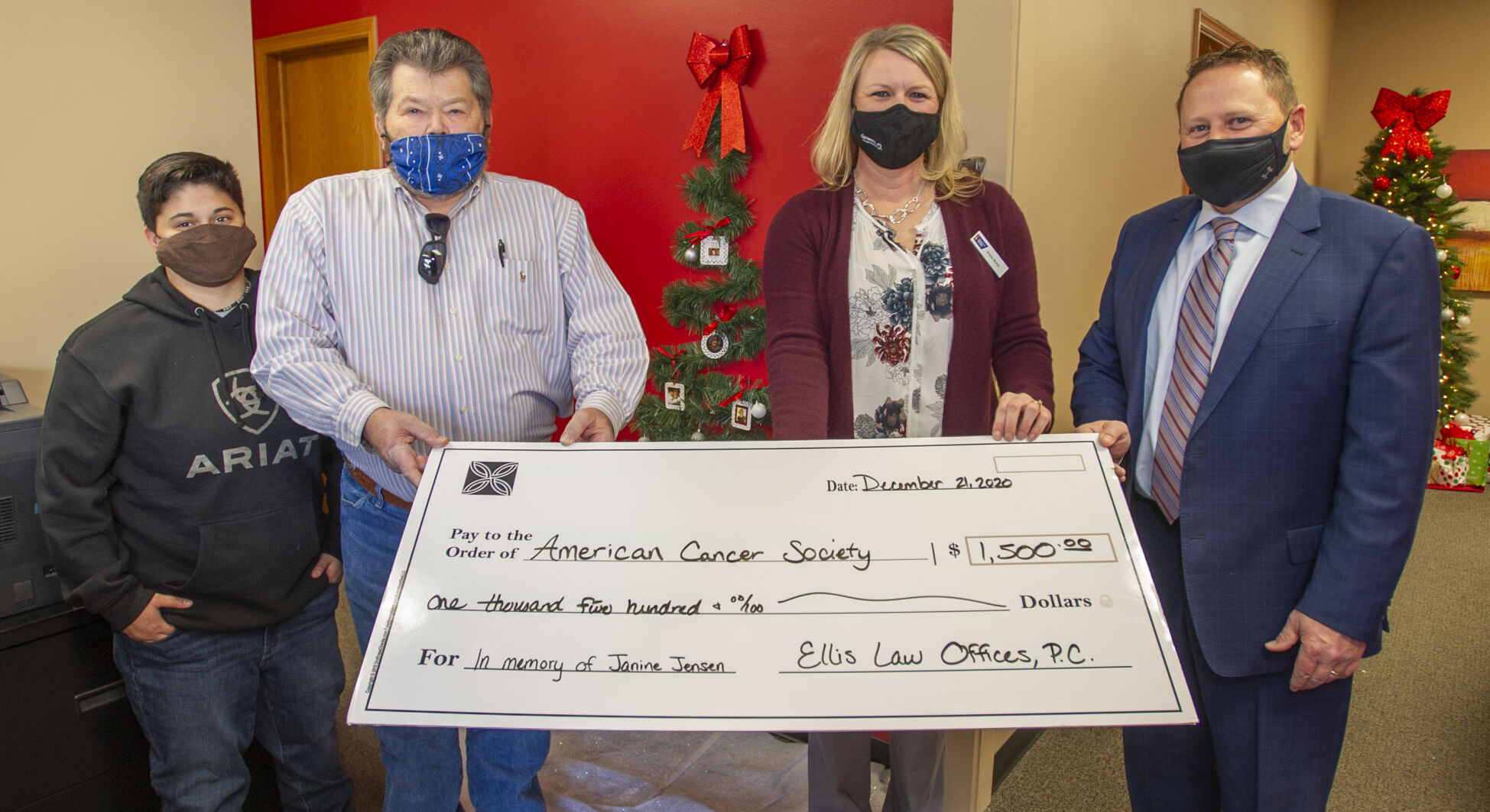 Ellis presents check to American Cancer Society